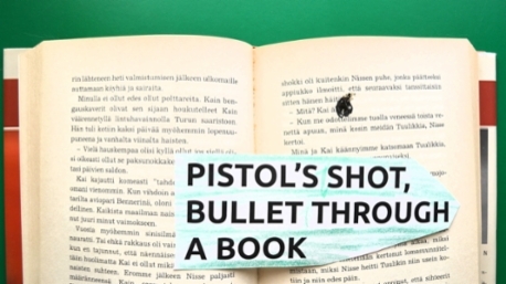 425._Pistols_shot_bullet_througt_a_book.jpg